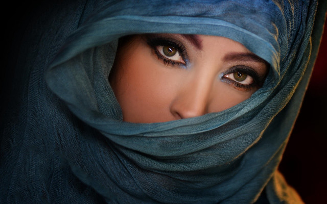 Serious woman blue scarf eyes free wallpaper for desktop - medium preview image