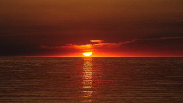 Sunset ocean boat bird cloud free wallpaper for desktop - medium preview image