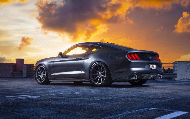 Mustang parking lot sunset cloudy free wallpaper for desktop - medium preview image