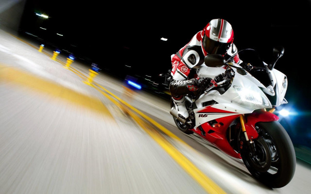 Motorcycle rider city street night free wallpaper for desktop - medium preview image