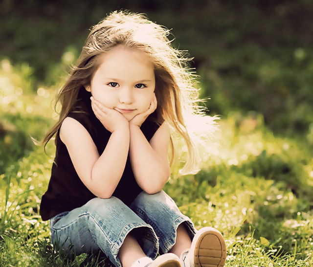 Little girl grass hands chin #2 free wallpaper for desktop - medium preview image