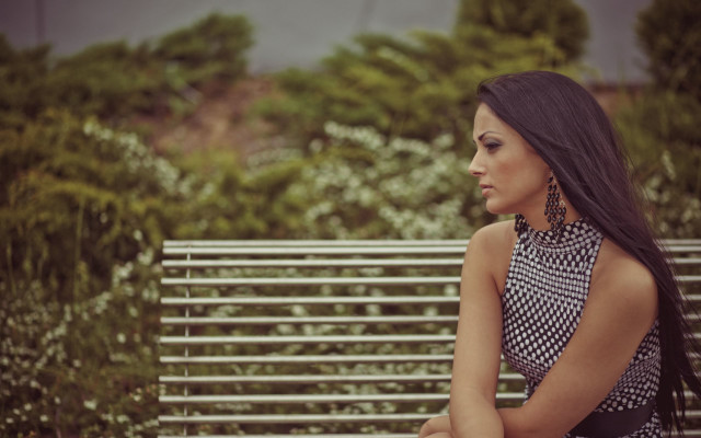 Woman park bench serious portrait free wallpaper for desktop - medium preview image