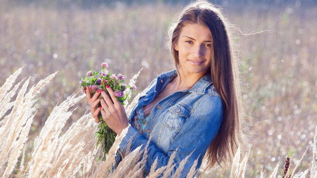 Woman field bouquet smiling outdoors free wallpaper for desktop - medium preview image