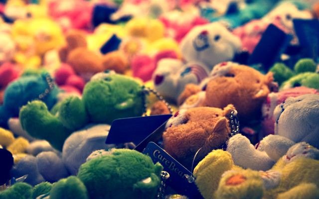 Stuffed animals table top bokeh free wallpaper for desktop - medium preview image