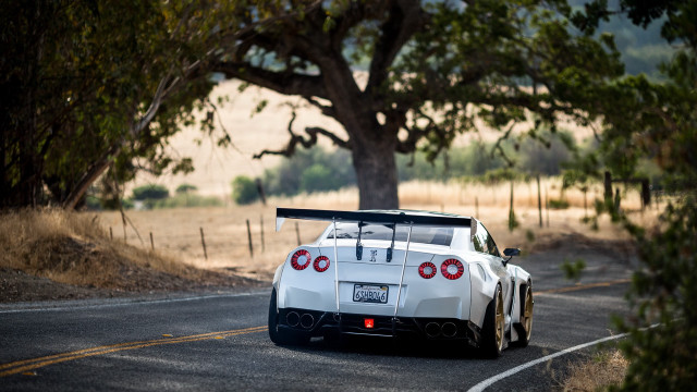 White sports car driving road #7 free wallpaper for desktop - medium preview image