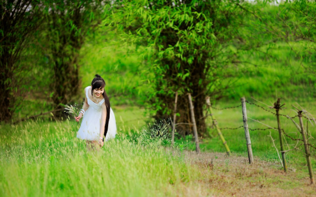Woman white dress field flowers free wallpaper for desktop - medium preview image