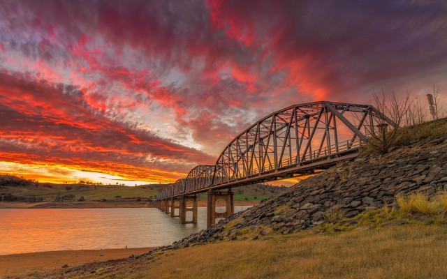 Bridge river red sky grassy free wallpaper for desktop - medium preview image