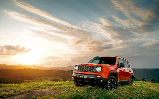 Jeep grassy hill sunset clouds free wallpaper for desktop - medium preview image