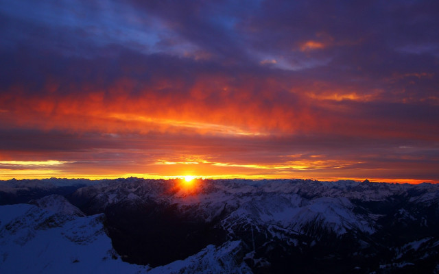Sunset mountain range orange sun free wallpaper for desktop - medium preview image
