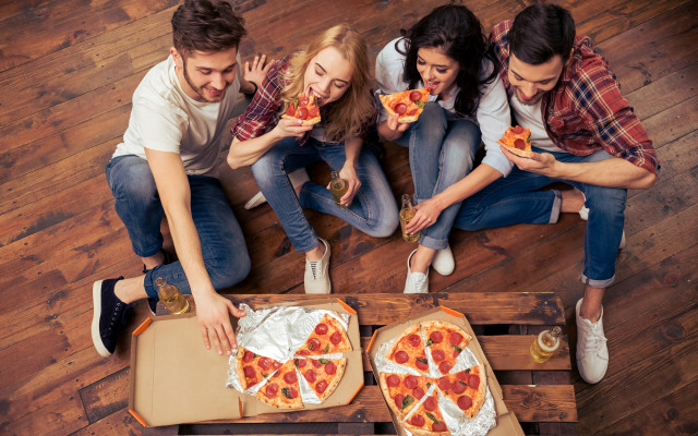 Group people eating pizza sitting free wallpaper for desktop - medium preview image