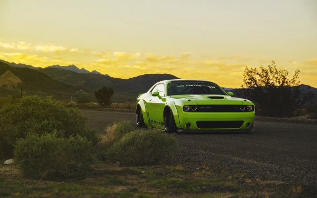 Green car mountains bushes sunset free wallpaper for desktop - medium preview image