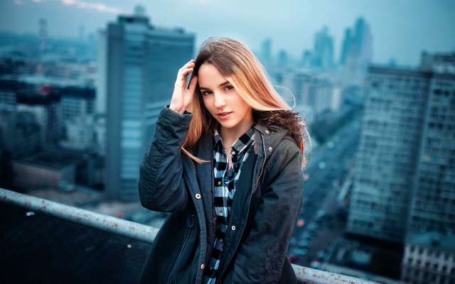 Woman black jacket cityscape bridge free wallpaper for desktop - medium preview image