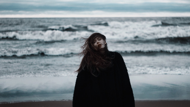 Beach man long hair ocean free wallpaper for desktop - medium preview image