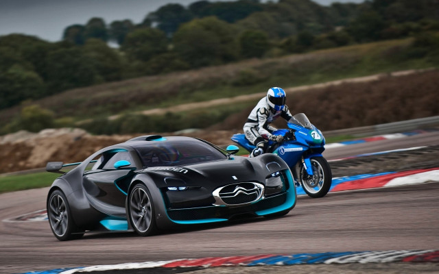 Motorcycle racecar motion blur mountain free wallpaper for desktop - medium preview image