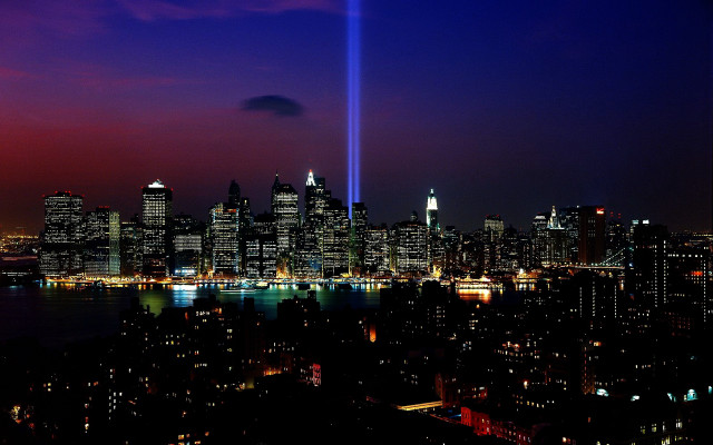 City skyline light beam night free wallpaper for desktop - medium preview image