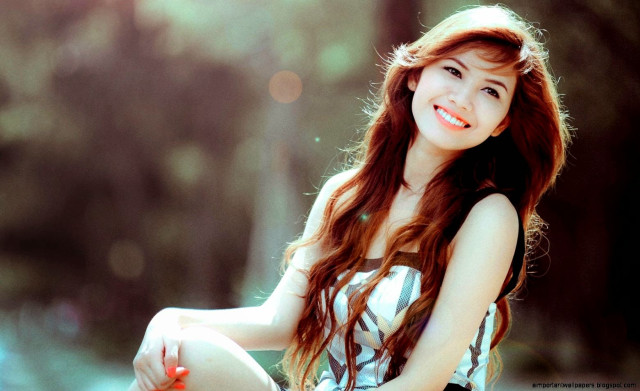 Woman smiling bench long hair free wallpaper for desktop - medium preview image