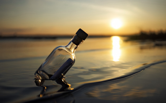Beach sunset bottle reflection surreal free wallpaper for desktop - medium preview image
