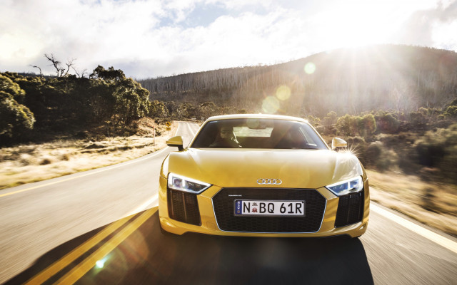 Yellow car mountains road sunset free wallpaper for desktop - medium preview image