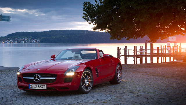 Red sports car cobblestone lake free wallpaper for desktop - medium preview image