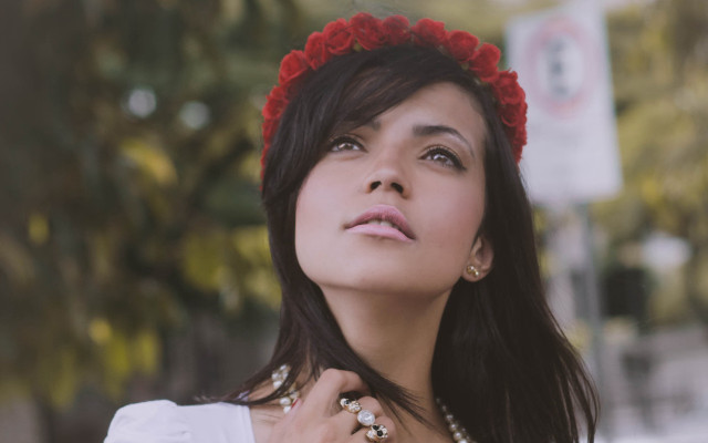 Woman redflower necklace lookingup bokeh free wallpaper for desktop - medium preview image