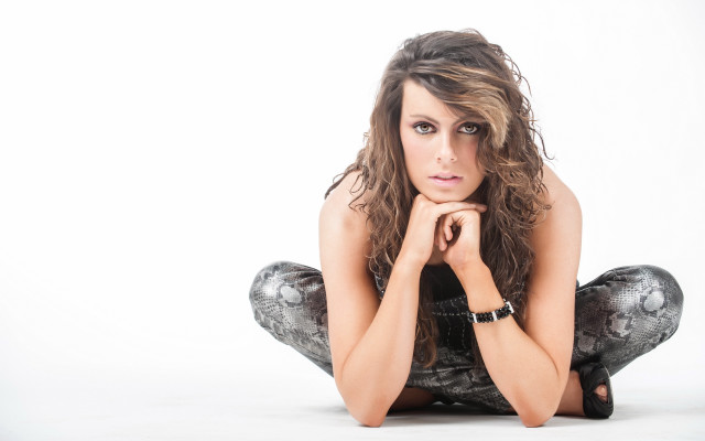 Woman sitting portrait brown hair free wallpaper for desktop - medium preview image