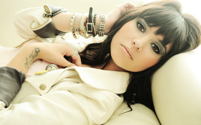 Beautiful tattooed woman couch blackhair free wallpaper for desktop - medium preview image