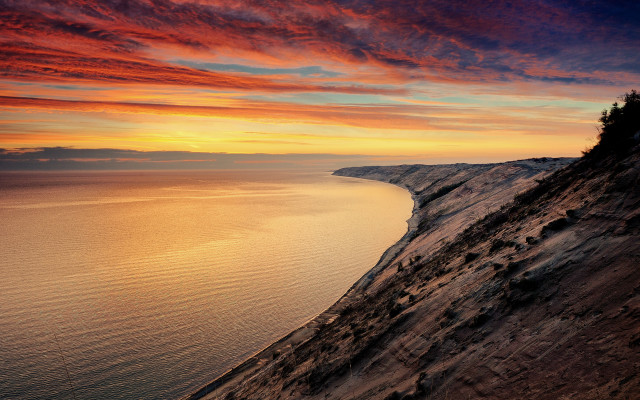 Sunset cliff water red sky #2 free wallpaper for desktop - medium preview image
