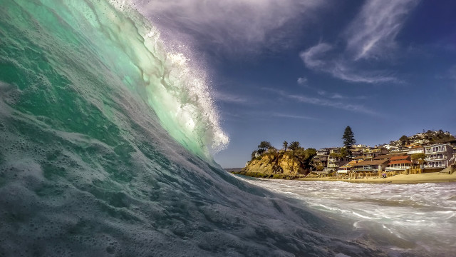 Large wave beach town horizon free wallpaper for desktop - medium preview image