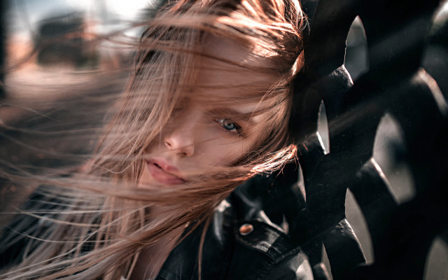 Girl long hair fence wind free wallpaper for desktop - medium preview image