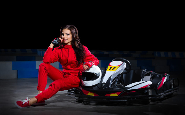 Woman in red snowmobile phone free wallpaper for desktop - medium preview image