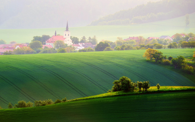 Green field church foggy sky free wallpaper for desktop - medium preview image