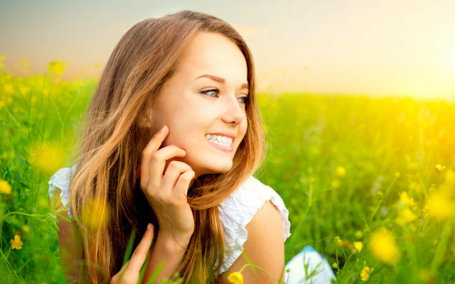Woman smiling flower field outdoors free wallpaper for desktop - medium preview image