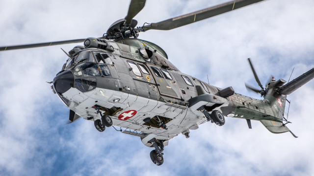 Military helicopter cloudy sky pilot free wallpaper for desktop - medium preview image