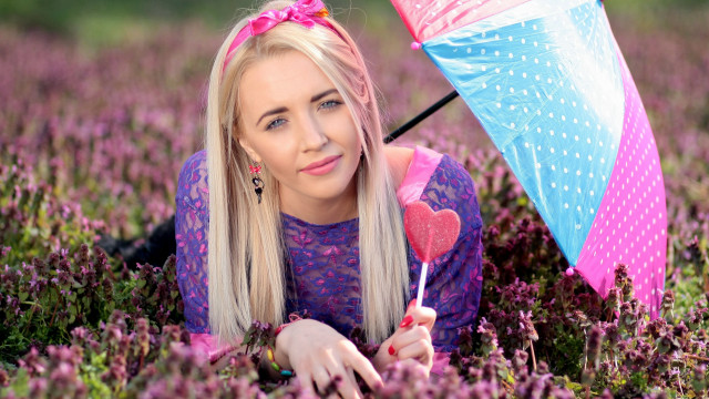 Woman field umbrella lollipop flowers free wallpaper for desktop - medium preview image