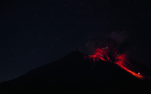 Volcano red glow night stars free wallpaper for desktop - medium preview image