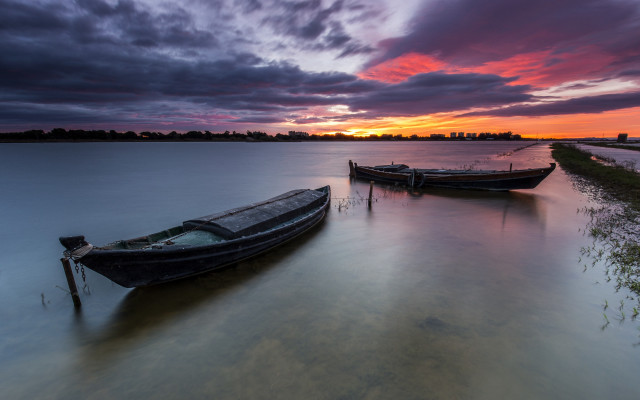 Boats sunset dusk clouds ocean free wallpaper for desktop - medium preview image