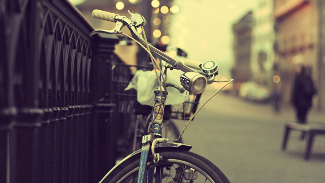 Bicycle fence streetcorner person bench free wallpaper for desktop - medium preview image