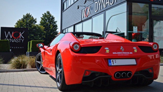 Red sports car building jigsaw free wallpaper for desktop - medium preview image