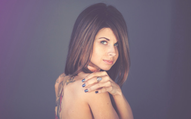 Woman tattoo arm chest pose free wallpaper for desktop - medium preview image