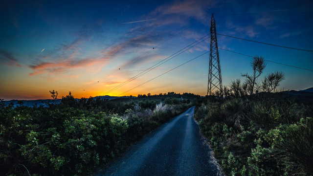 Sunset road powerlines trees mountain free wallpaper for desktop - medium preview image