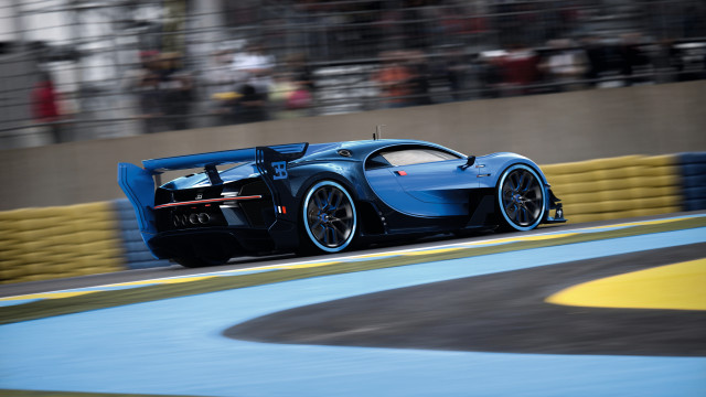 Blue racecar racing track crowd free wallpaper for desktop - medium preview image
