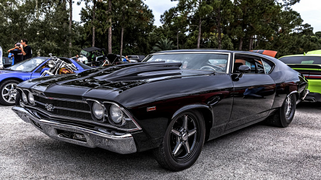 Black muscle car parked people free wallpaper for desktop - medium preview image