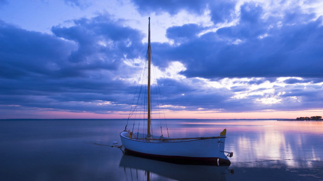 Sailboat sunset clouds water horizon free wallpaper for desktop - medium preview image
