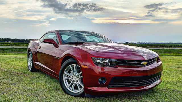Red chevrolet camaro field cloudy free wallpaper for desktop - medium preview image