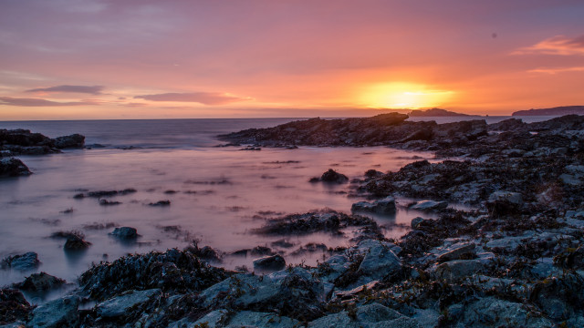 Sunset rocky beach water cityscape #2 free wallpaper for desktop - medium preview image