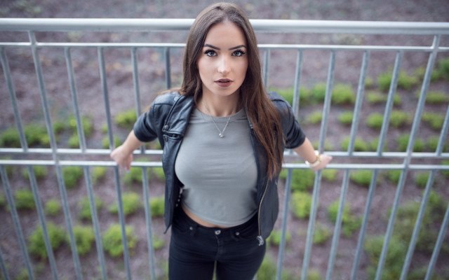 Woman fence serious model denim free wallpaper for desktop - medium preview image