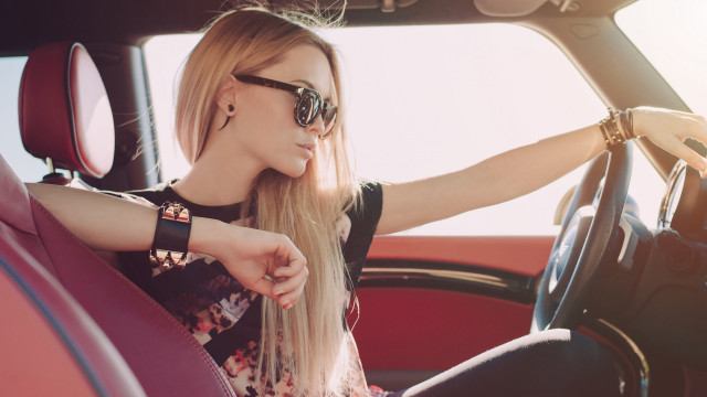 Serious blonde woman car fashion free wallpaper for desktop - medium preview image
