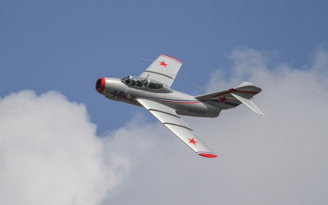 Small airplane cloudy sky red #2 free wallpaper for desktop - medium preview image