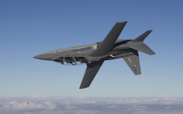 Gray airplane flying blue sky free wallpaper for desktop - medium preview image