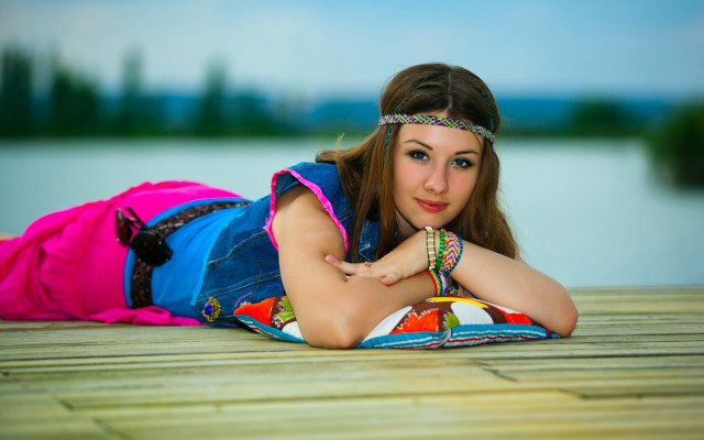 Woman laying water colorful dress free wallpaper for desktop - medium preview image